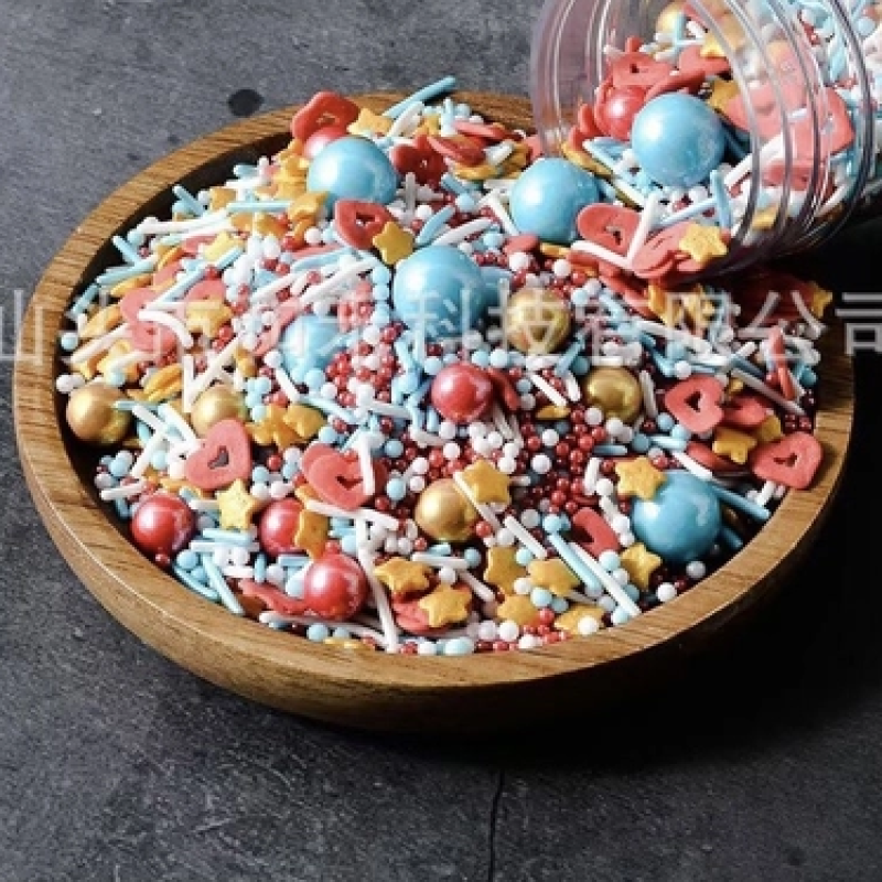 Cốm đường mix bi tròn xanh vàng và tim rỗng đỏ (túi 100gam)